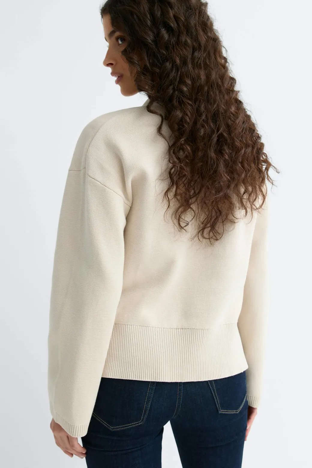 Asymmetric knitted cardigan
