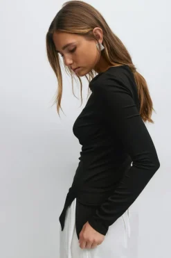 Asymmetric long sleeve top