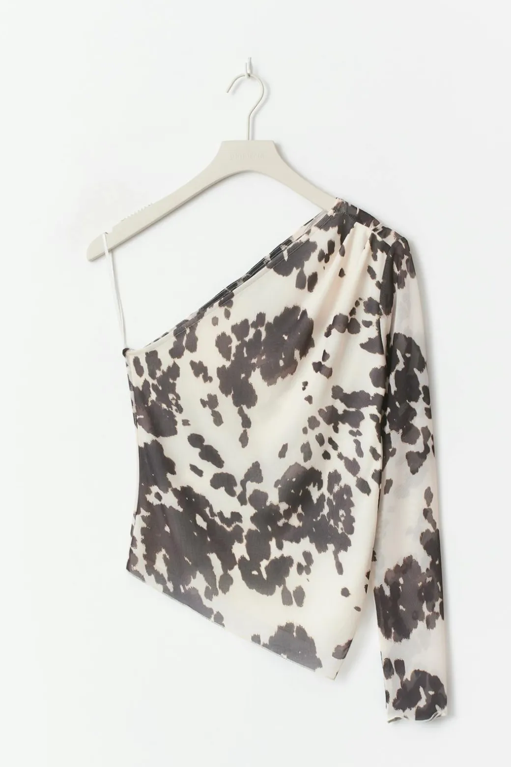 Asymmetric mesh top