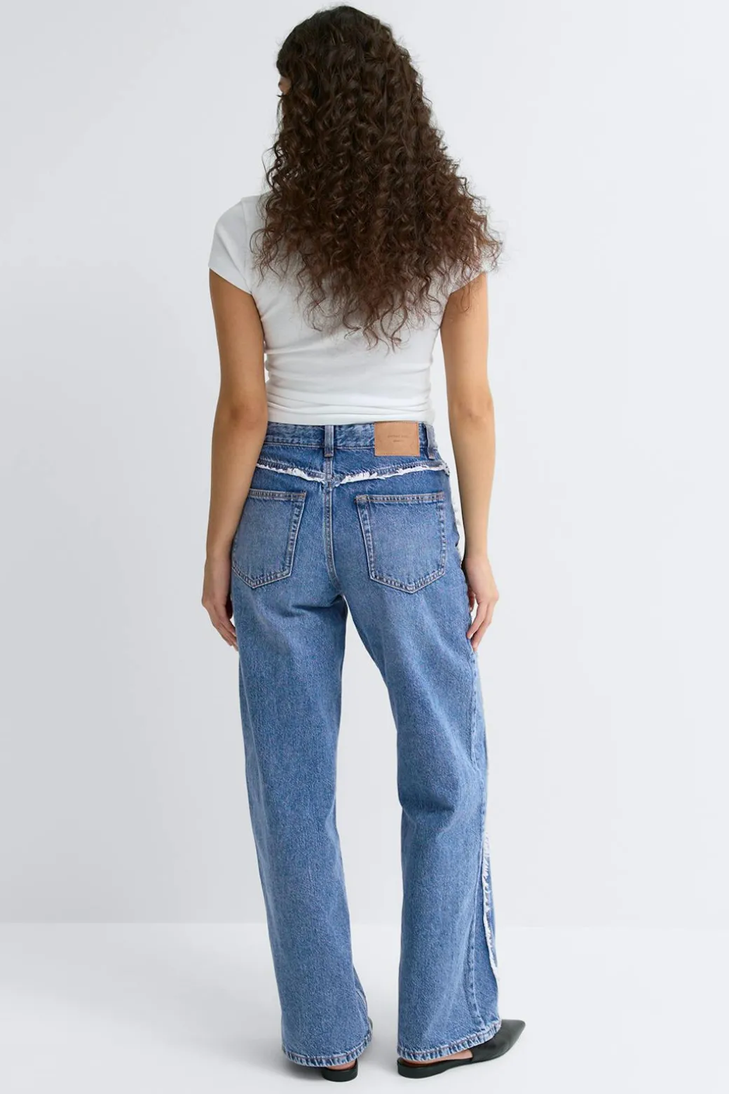 Fringe seam jeans