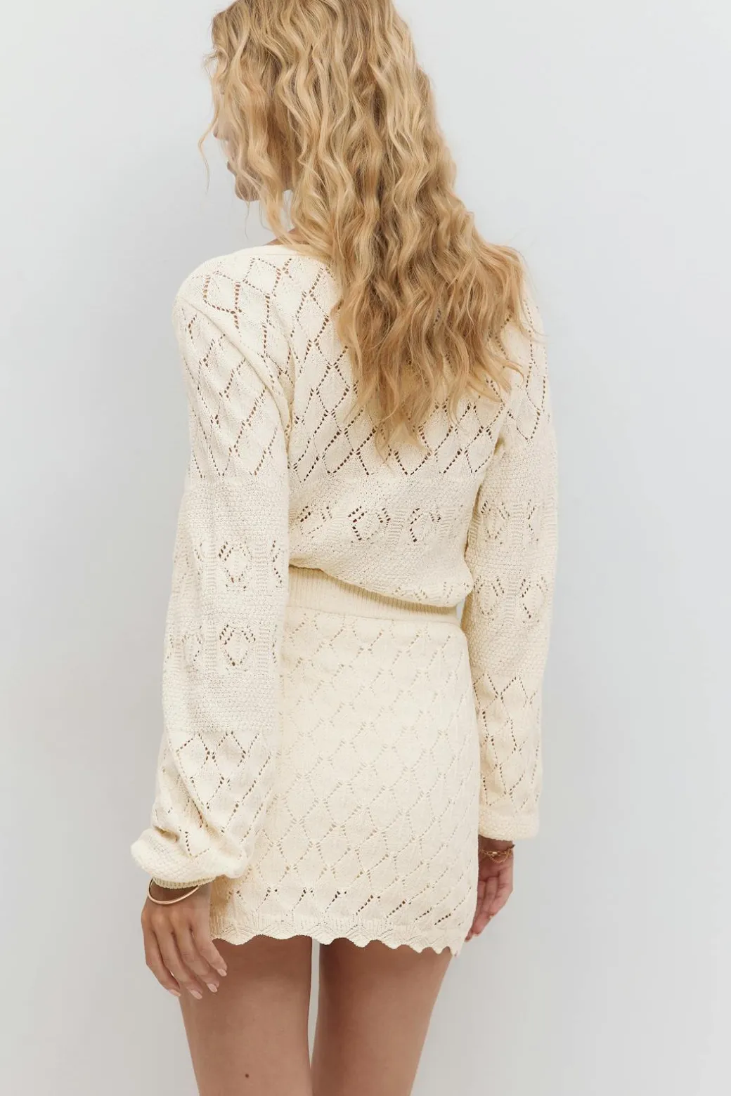Knitted crochet mini skirt