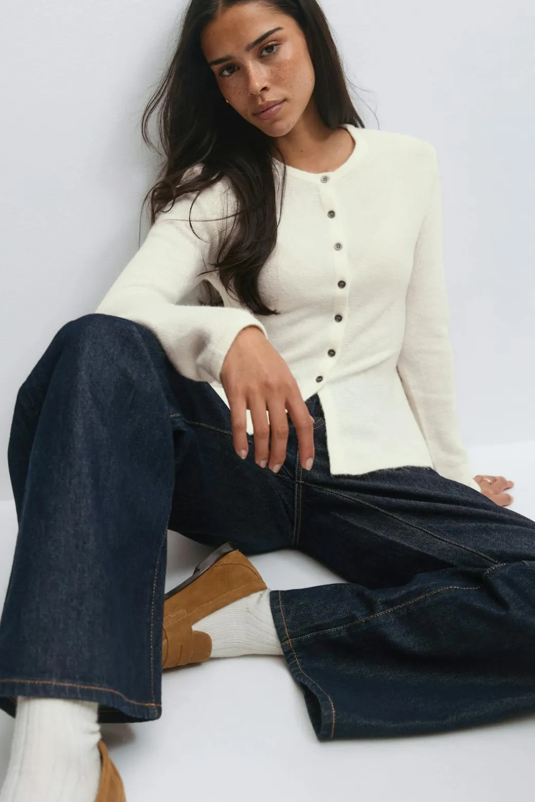 Knitted peplum cardigan