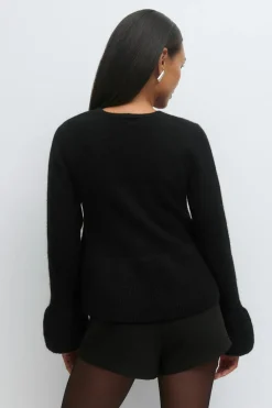 Knitted peplum cardigan