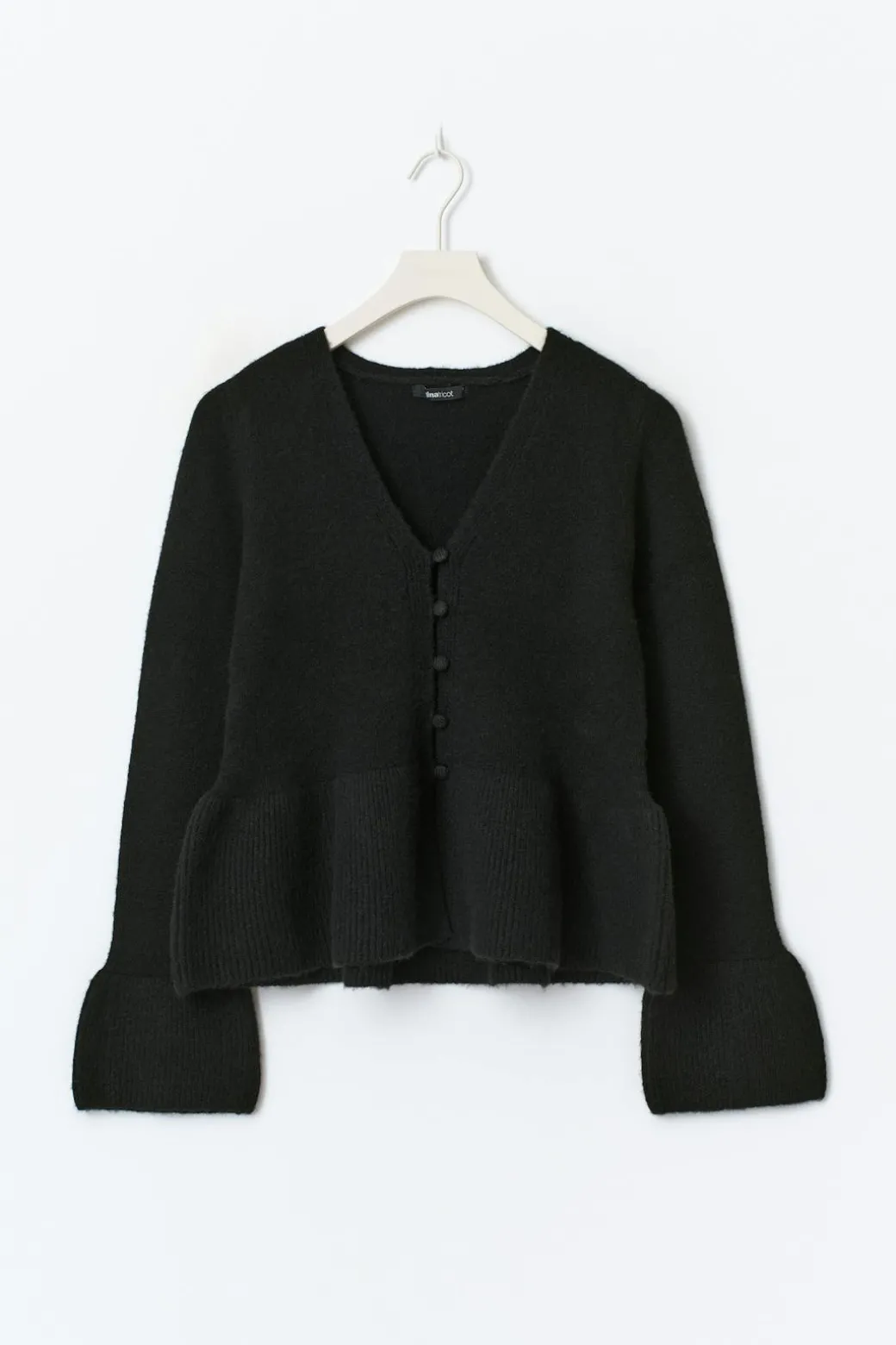 Knitted peplum cardigan