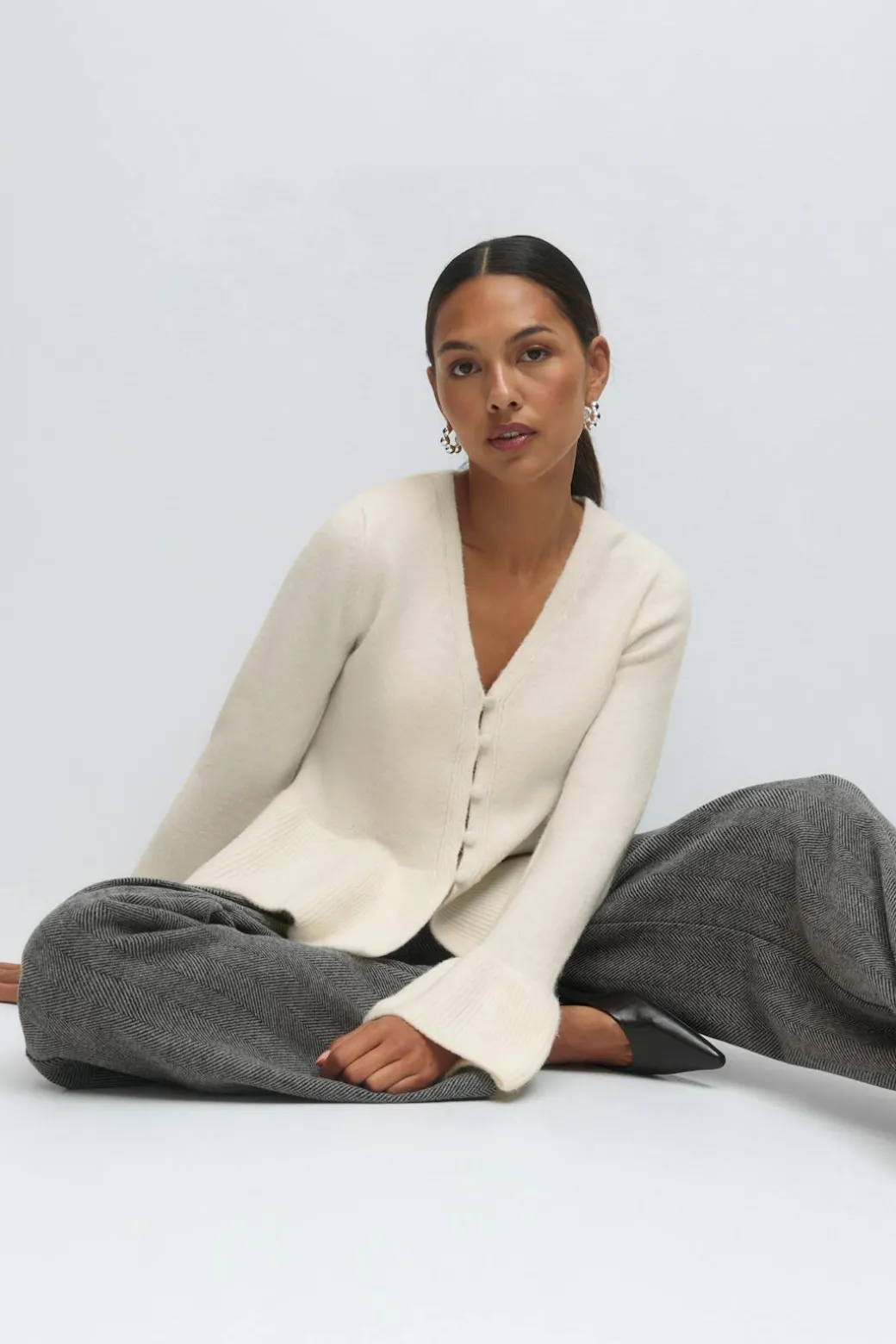 Knitted peplum cardigan