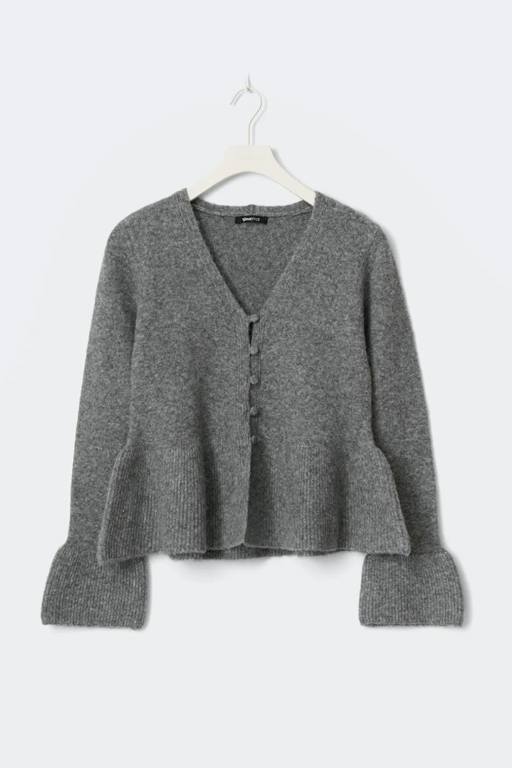 Knitted peplum cardigan