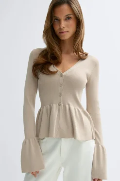 Knitted peplum cardigan