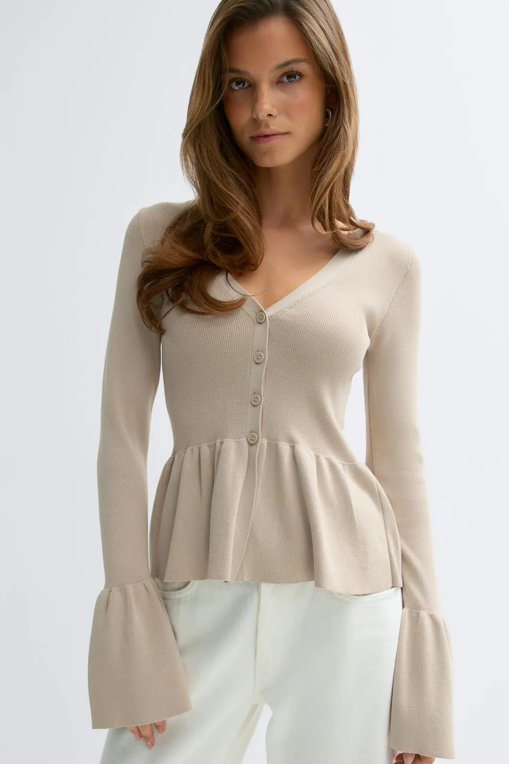 Knitted peplum cardigan