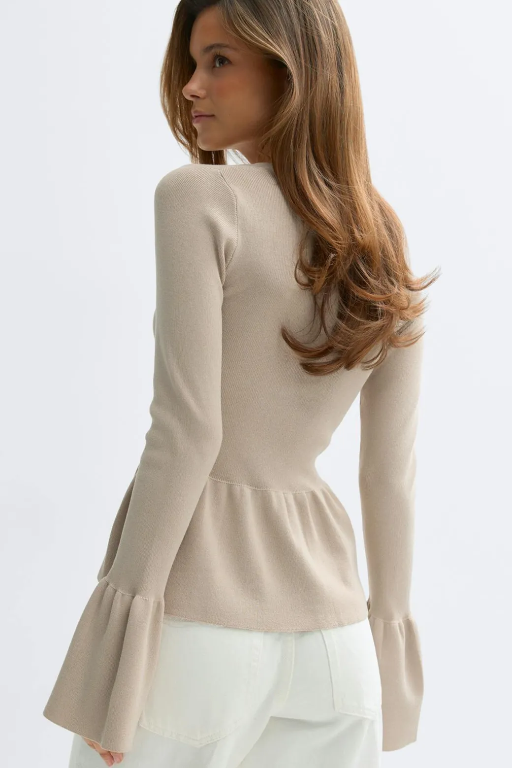 Knitted peplum cardigan