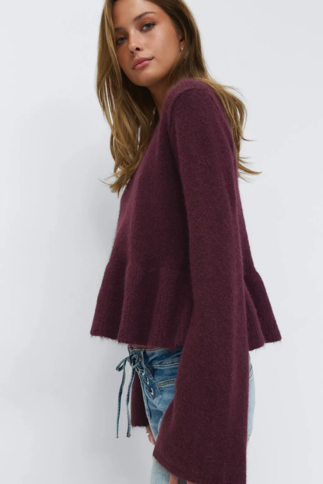 14+ knitted peplum sweater