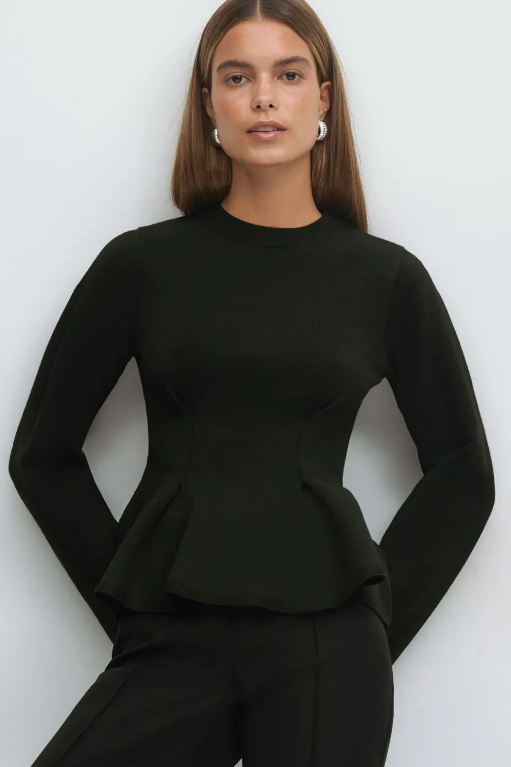 Knitted peplum top