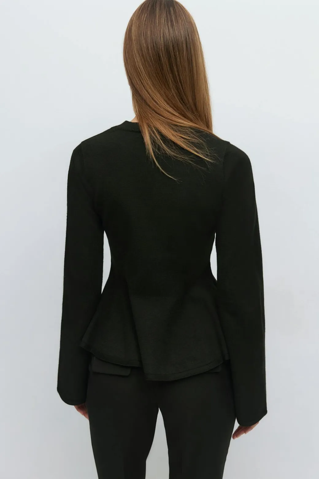 Knitted peplum top