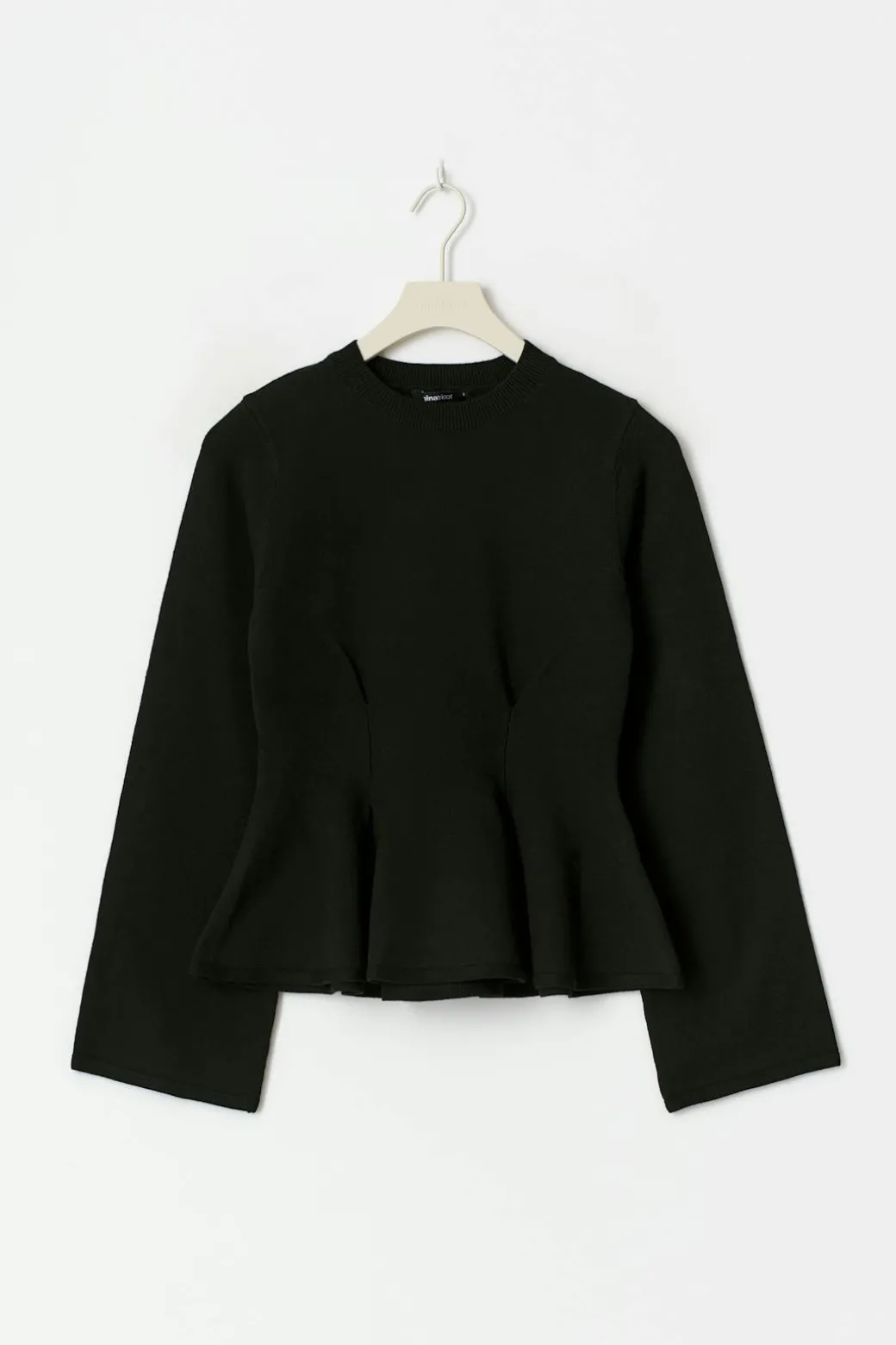 Knitted peplum top