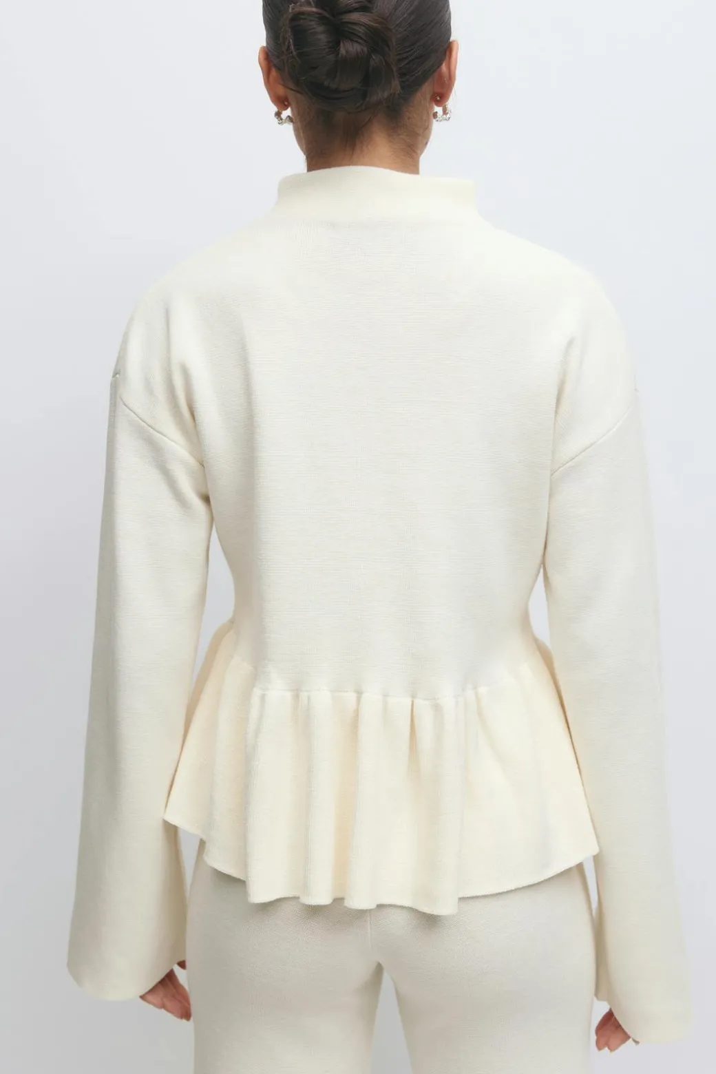 Knitted peplum top