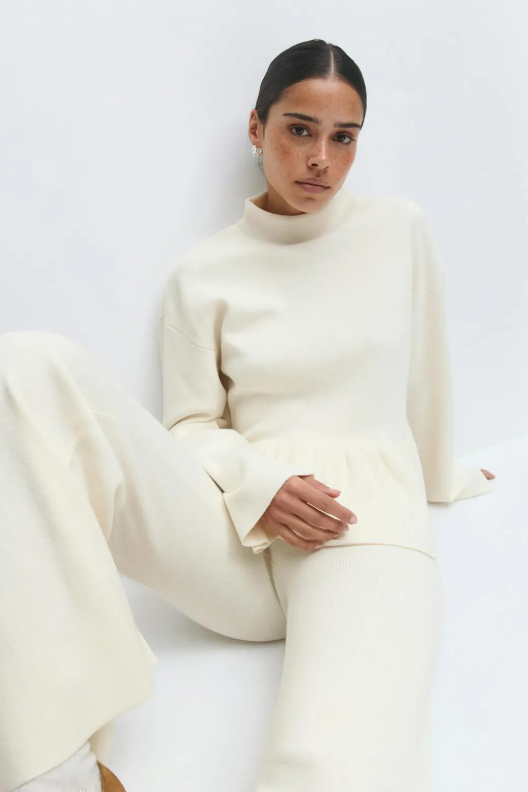 Knitted peplum top