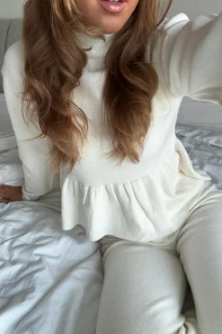 Knitted peplum top