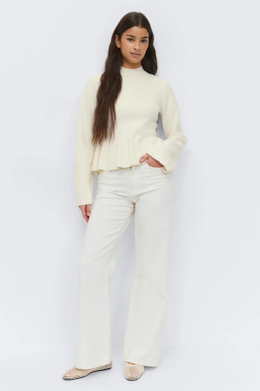 Knitted peplum top