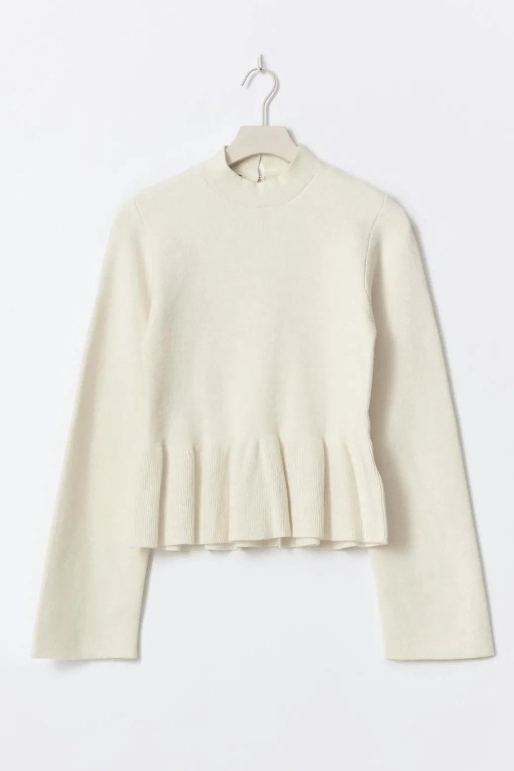 Knitted peplum top
