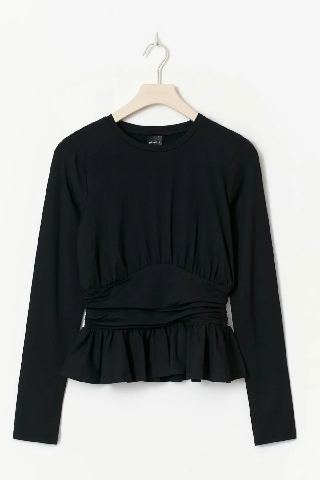 Long sleeve peplum top