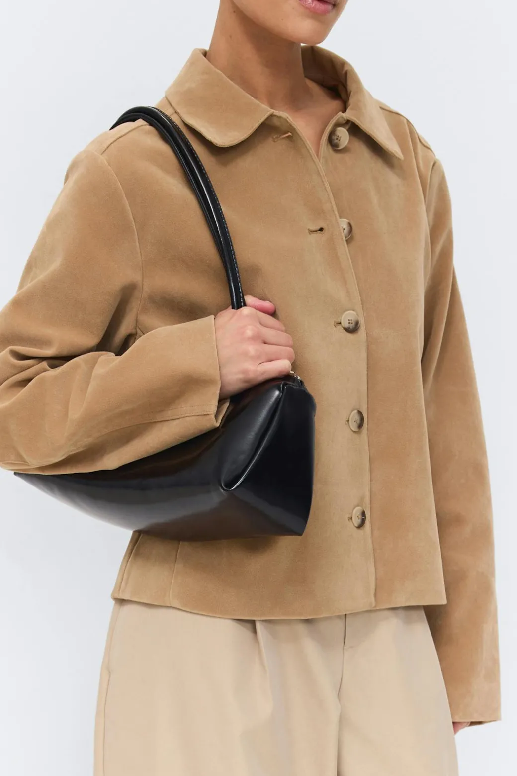 Patent shoulder bag