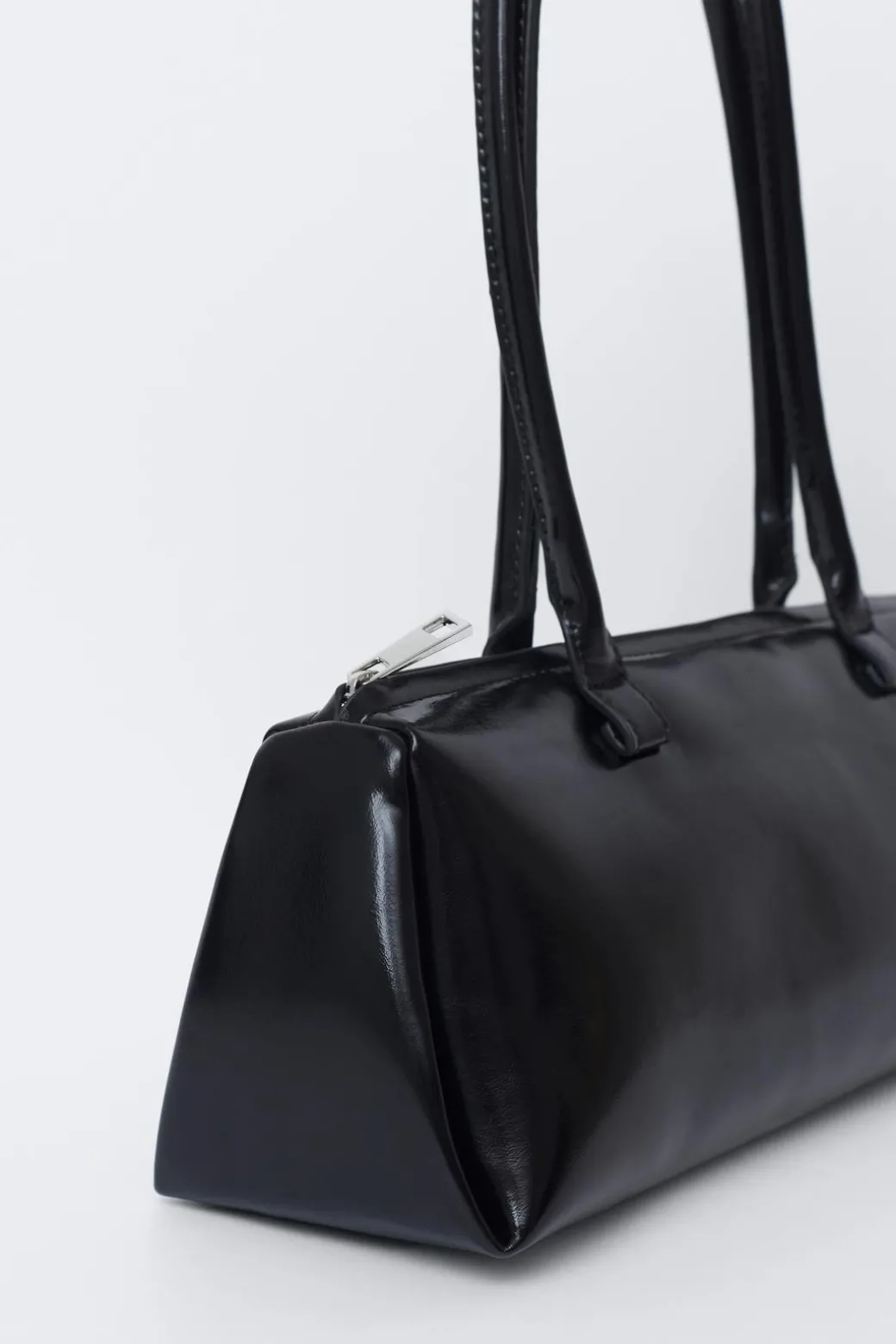 Patent shoulder bag