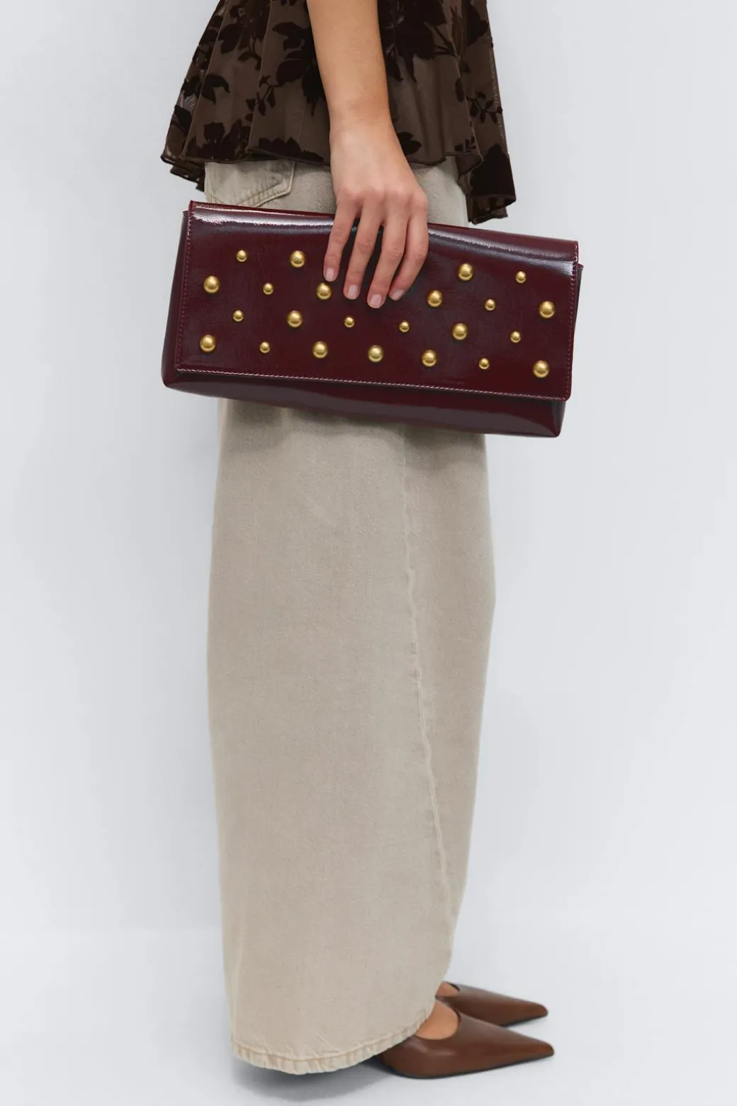 Patent studded clutch