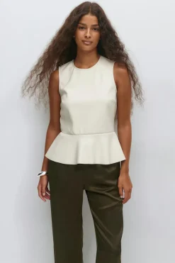 Pu peplum top
