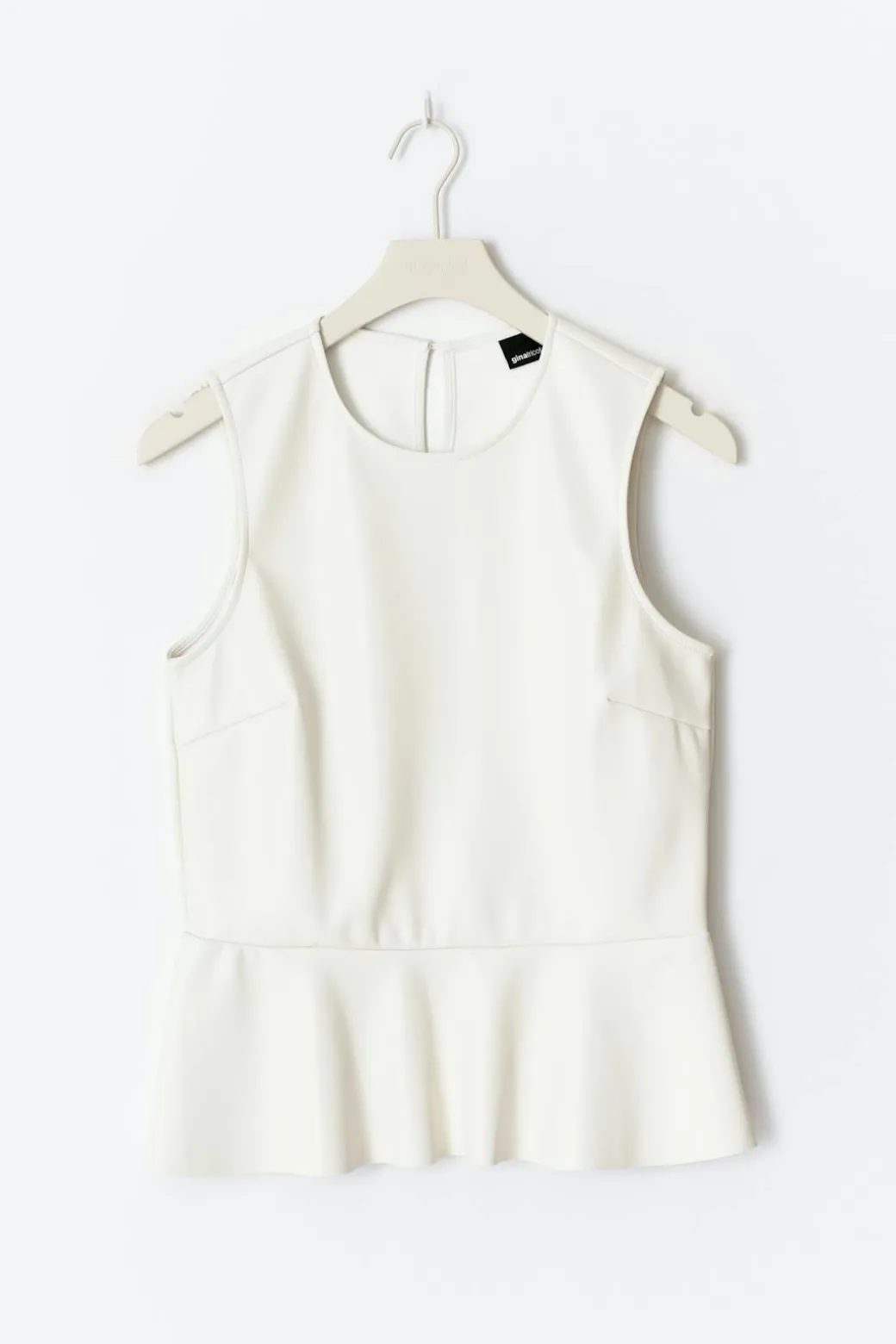 Pu peplum top
