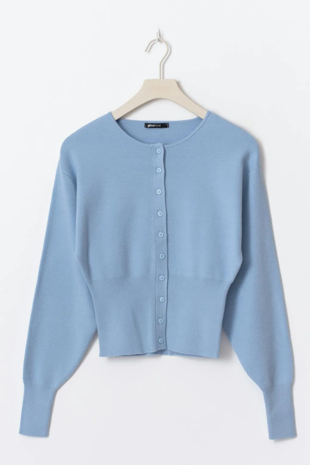 Shaped knitted cardigan
