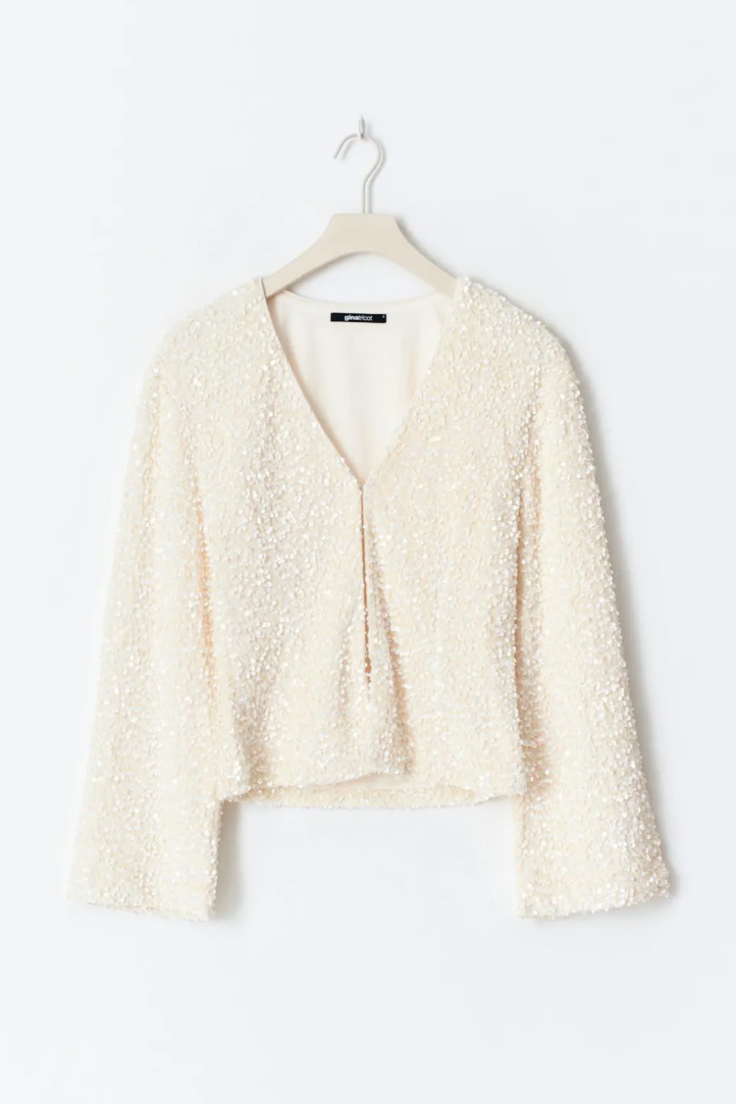 Shaped sequin top
