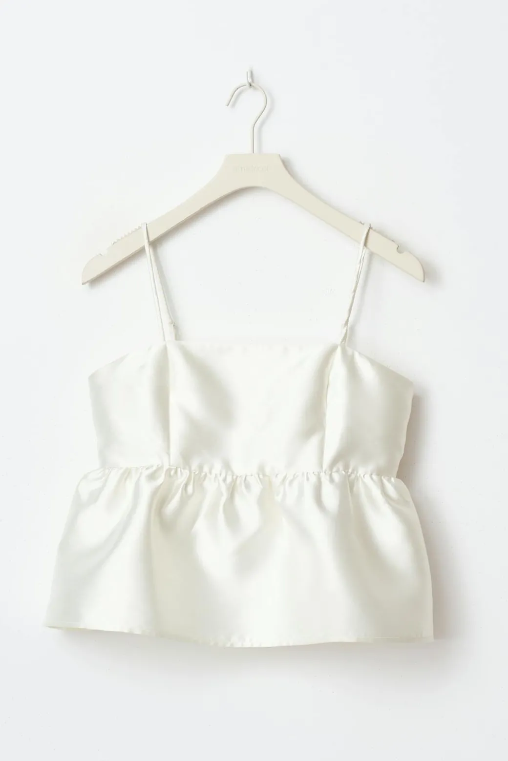 Shiny peplum top