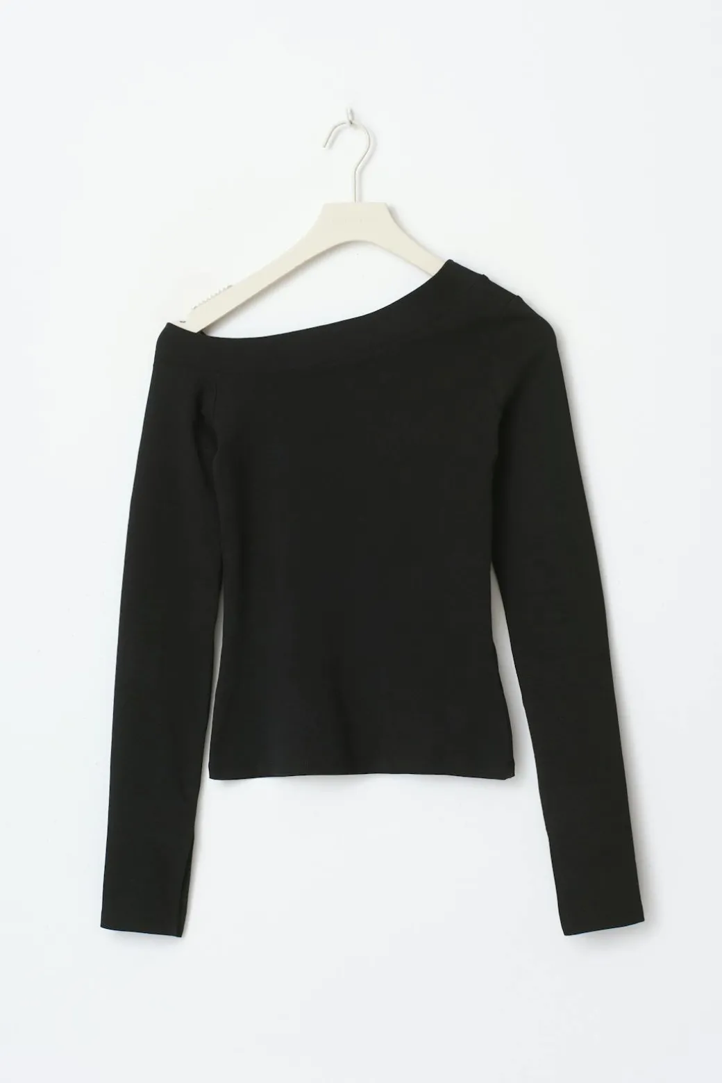 Sloped shoulder top